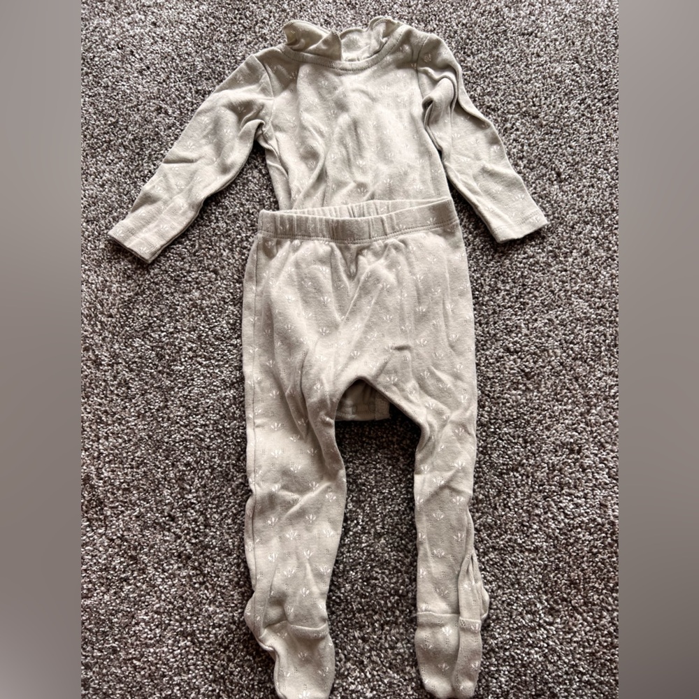 Zara set. Detail around the collar with footed bottoms. Like new!